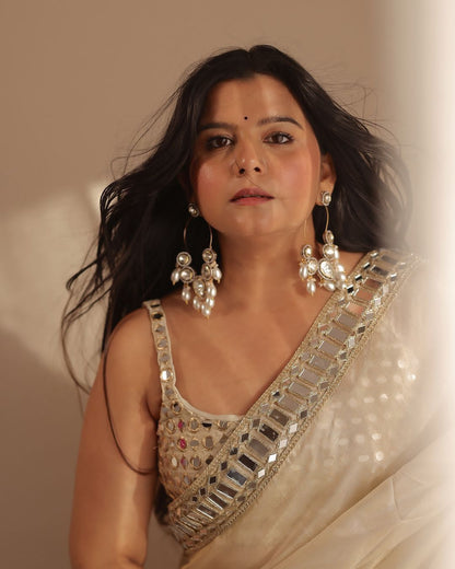 Sift satin Organza saree which is embedded with real mirror work Embroidery