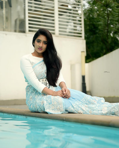 Pure geogert fabric with heavy lucknovi white thread work nd seqnce work in all over sarees with contrast silk blous