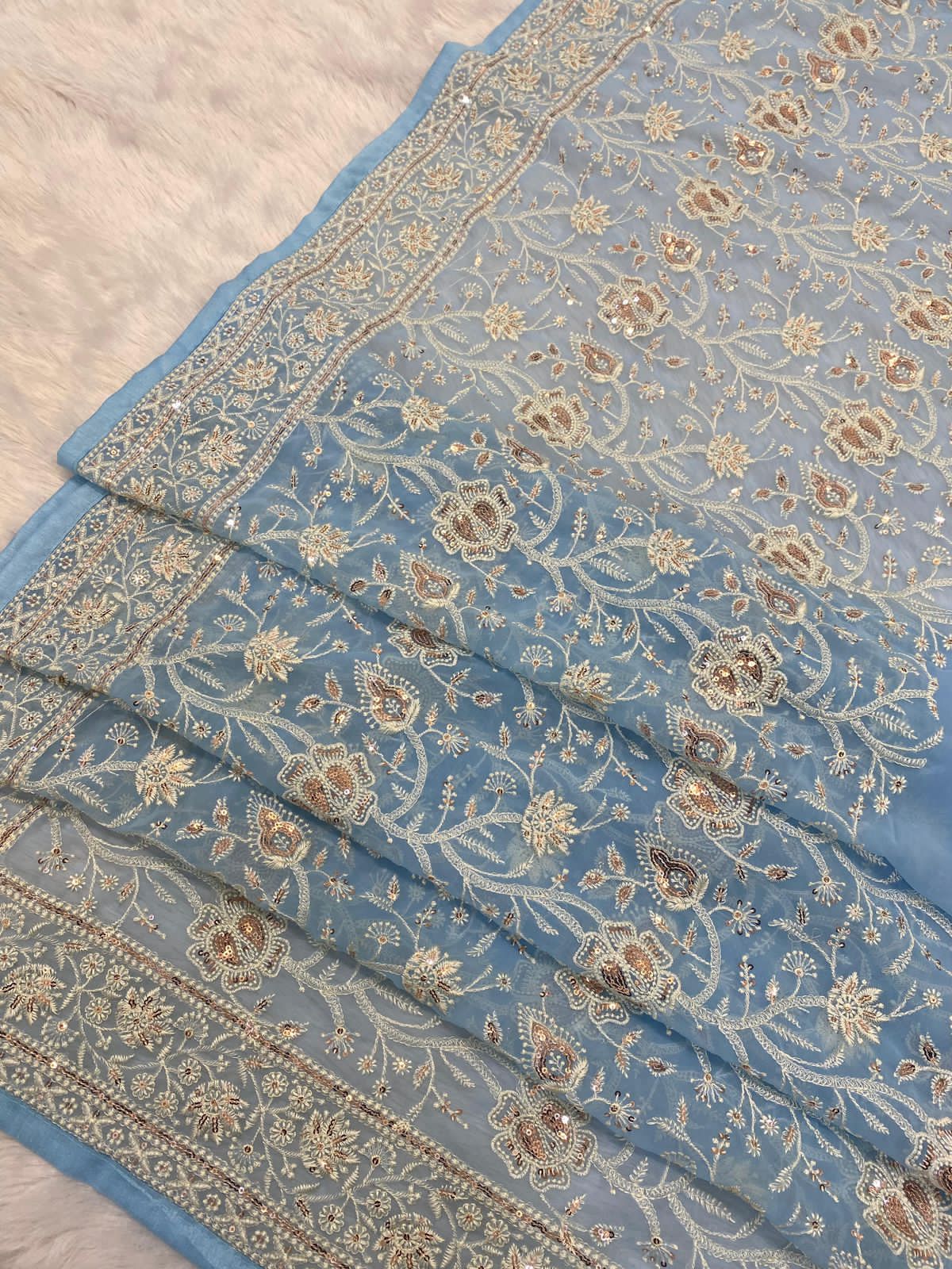 Pure geogert fabric with heavy lucknovi white thread work nd seqnce work in all over sarees with contrast silk blous
