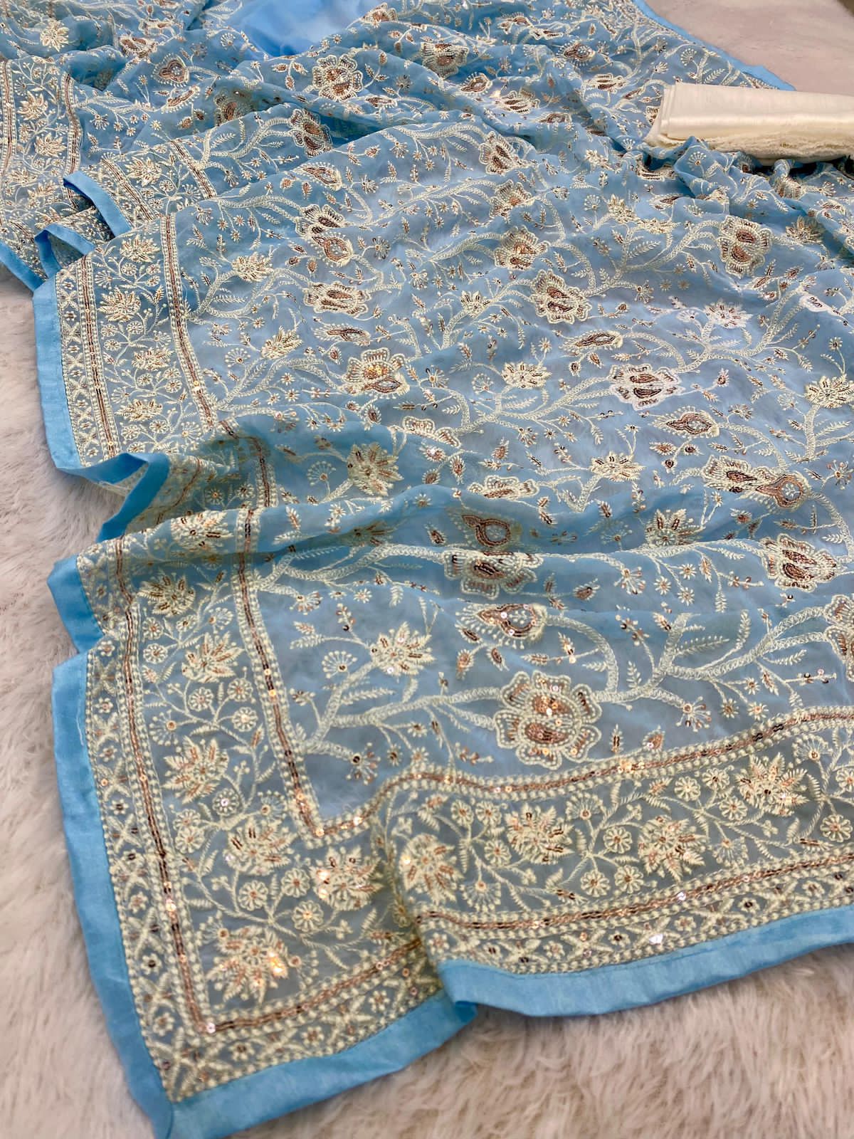Pure geogert fabric with heavy lucknovi white thread work nd seqnce work in all over sarees with contrast silk blous