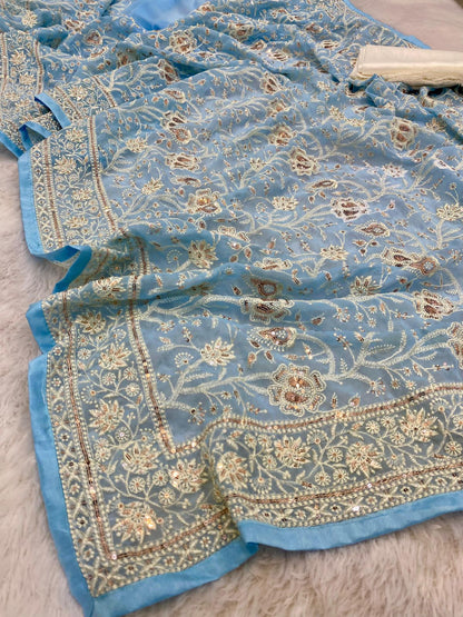 Pure geogert fabric with heavy lucknovi white thread work nd seqnce work in all over sarees with contrast silk blous