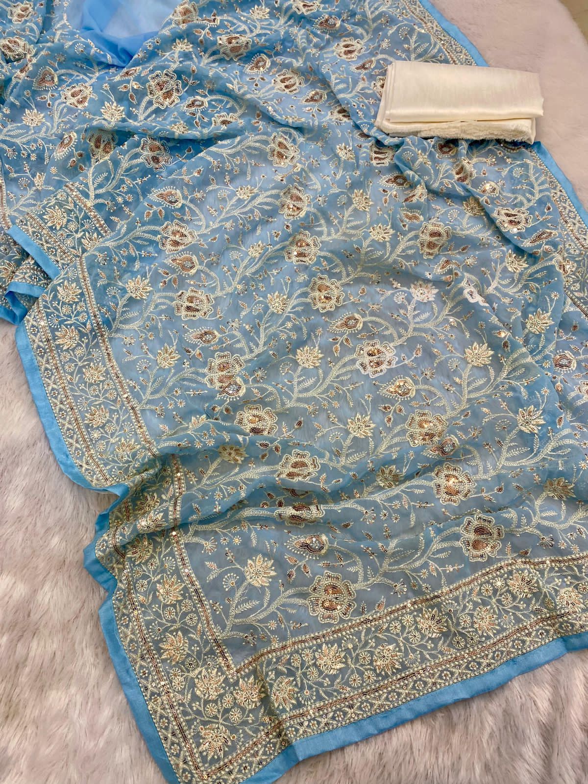 Pure geogert fabric with heavy lucknovi white thread work nd seqnce work in all over sarees with contrast silk blous