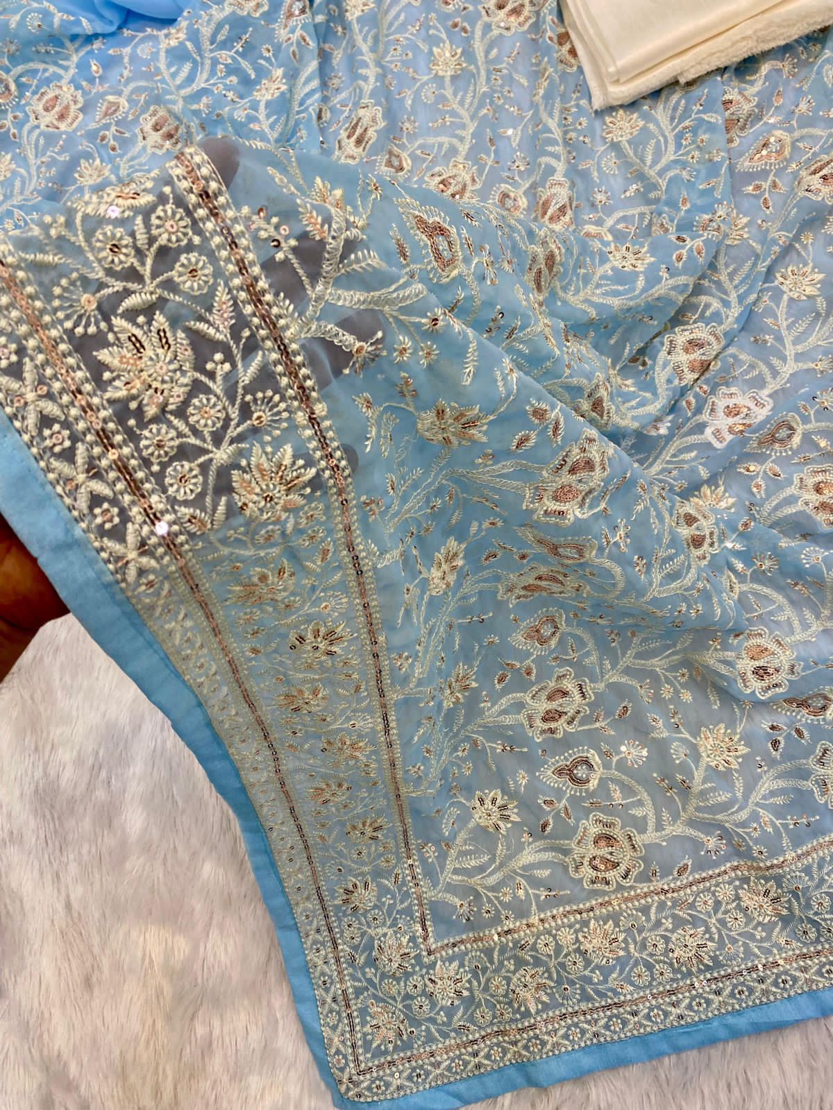Pure geogert fabric with heavy lucknovi white thread work nd seqnce work in all over sarees with contrast silk blous