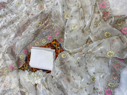 jimmyChoo fabric delicately crafted with multicolored thread and zaridori embroidery
