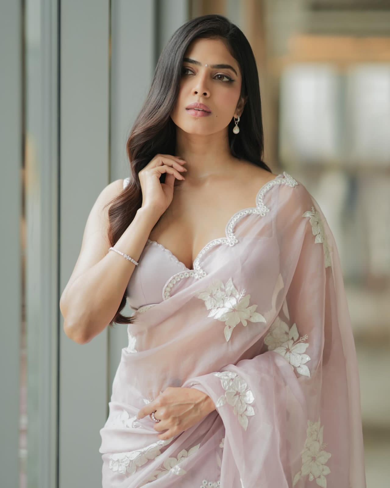 Soft satin Organza saree which is embedded with seqnce & threadwork
