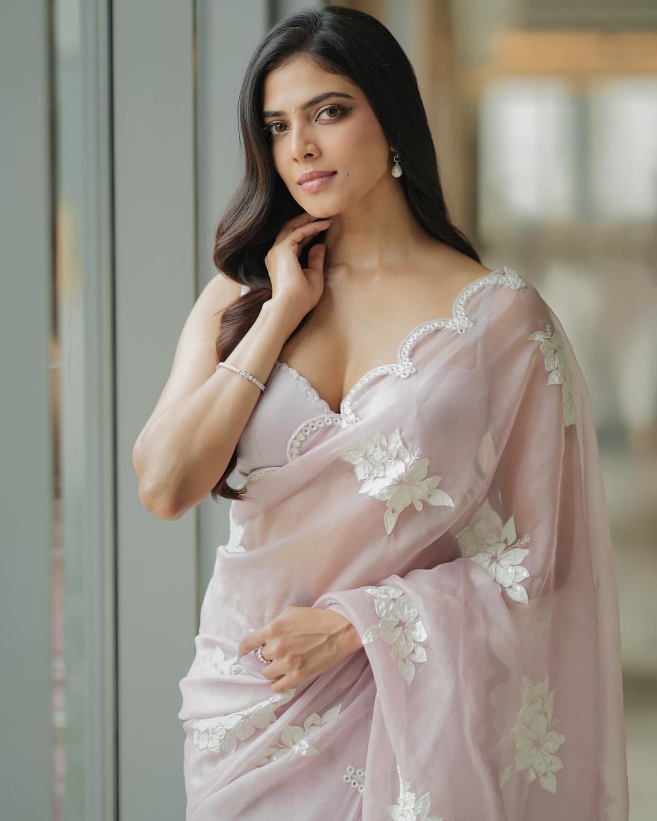 Soft satin Organza saree which is embedded with seqnce & threadwork