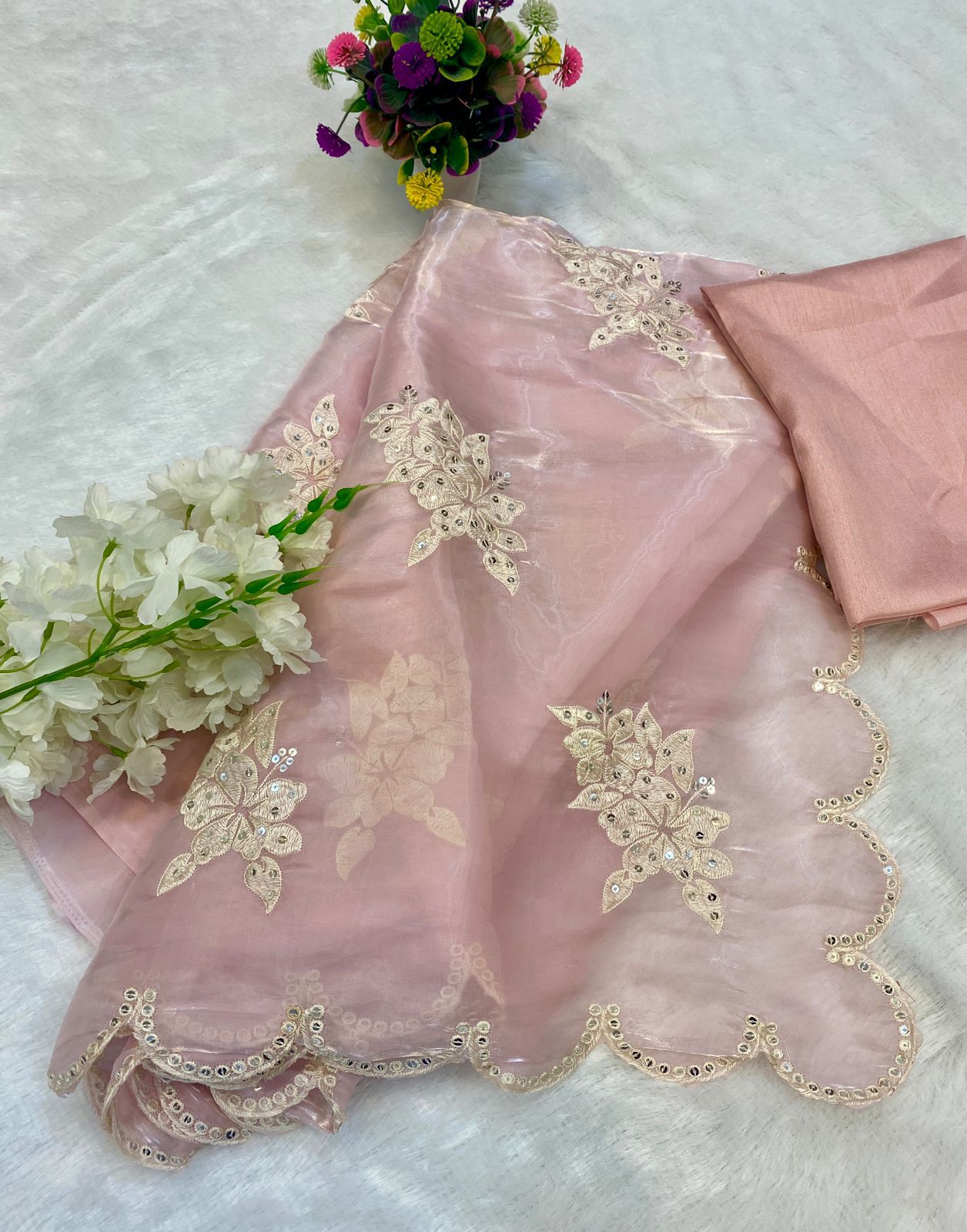Soft satin Organza saree which is embedded with seqnce & threadwork