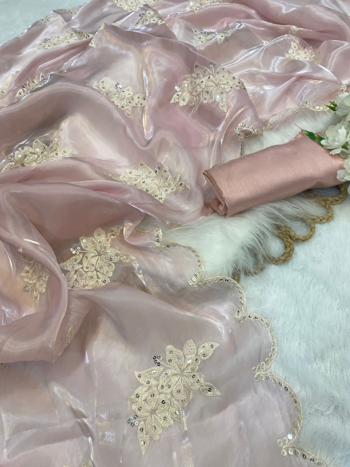 Soft satin Organza saree which is embedded with seqnce & threadwork