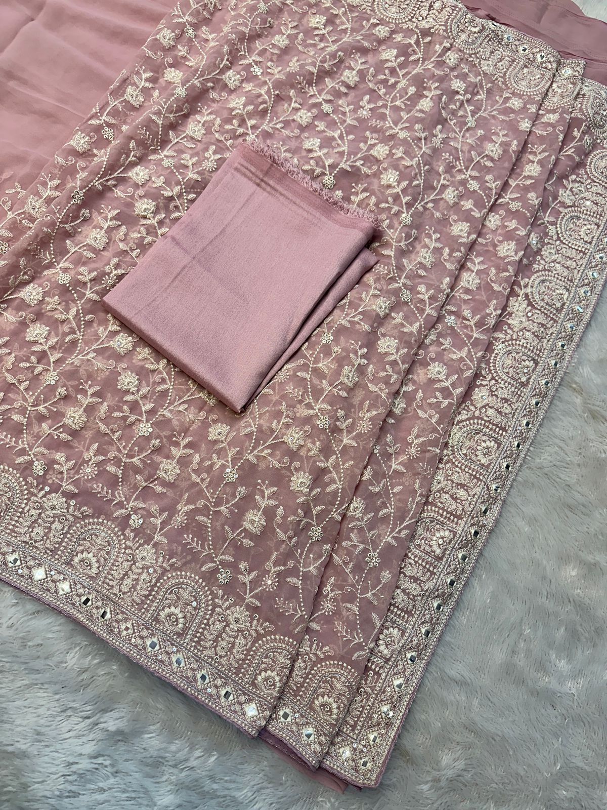 Faux geogert saree with white thread & seqnce full heavy work
