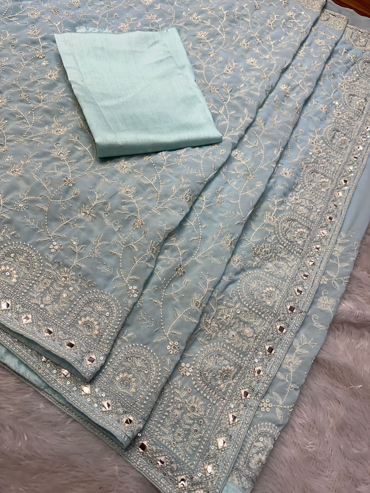 Faux geogert saree with white thread & seqnce full heavy work