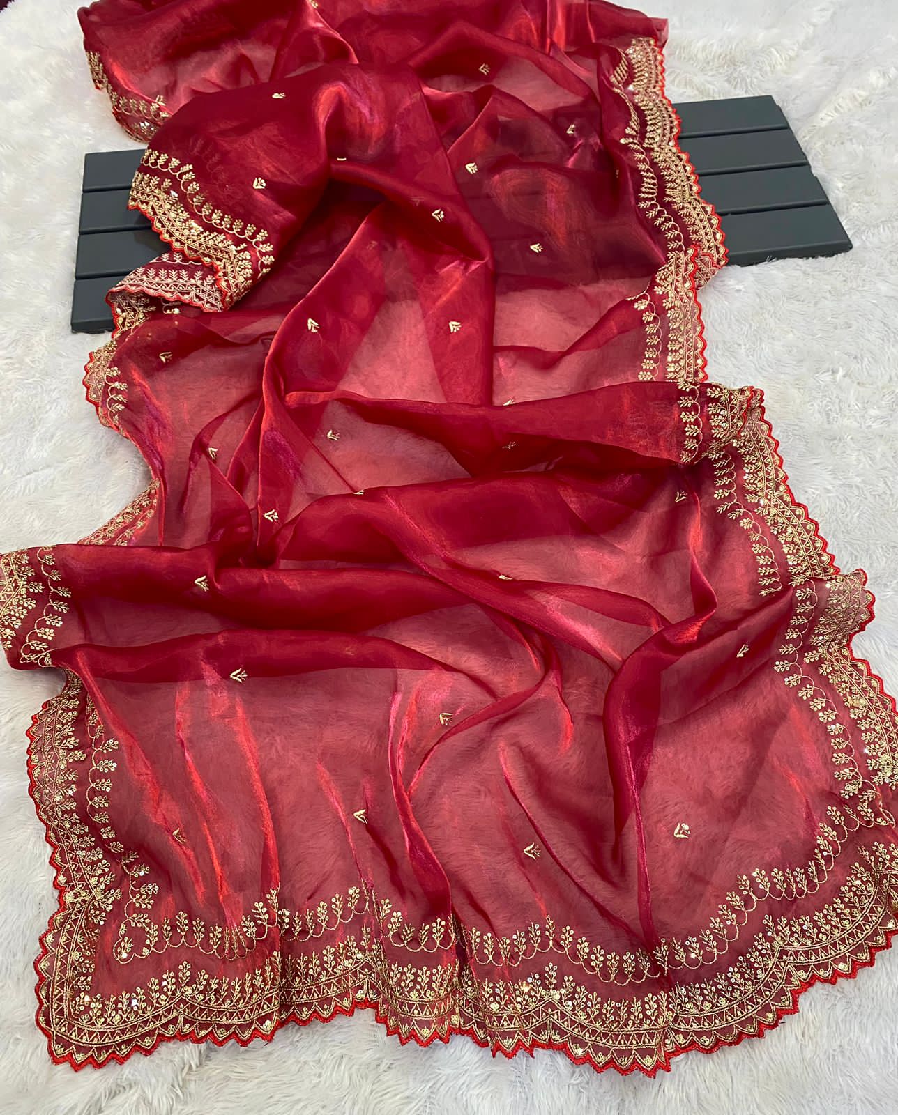 hinning pure crystal silk Jimmy choo sarees with seqnce & golden zari embroidered