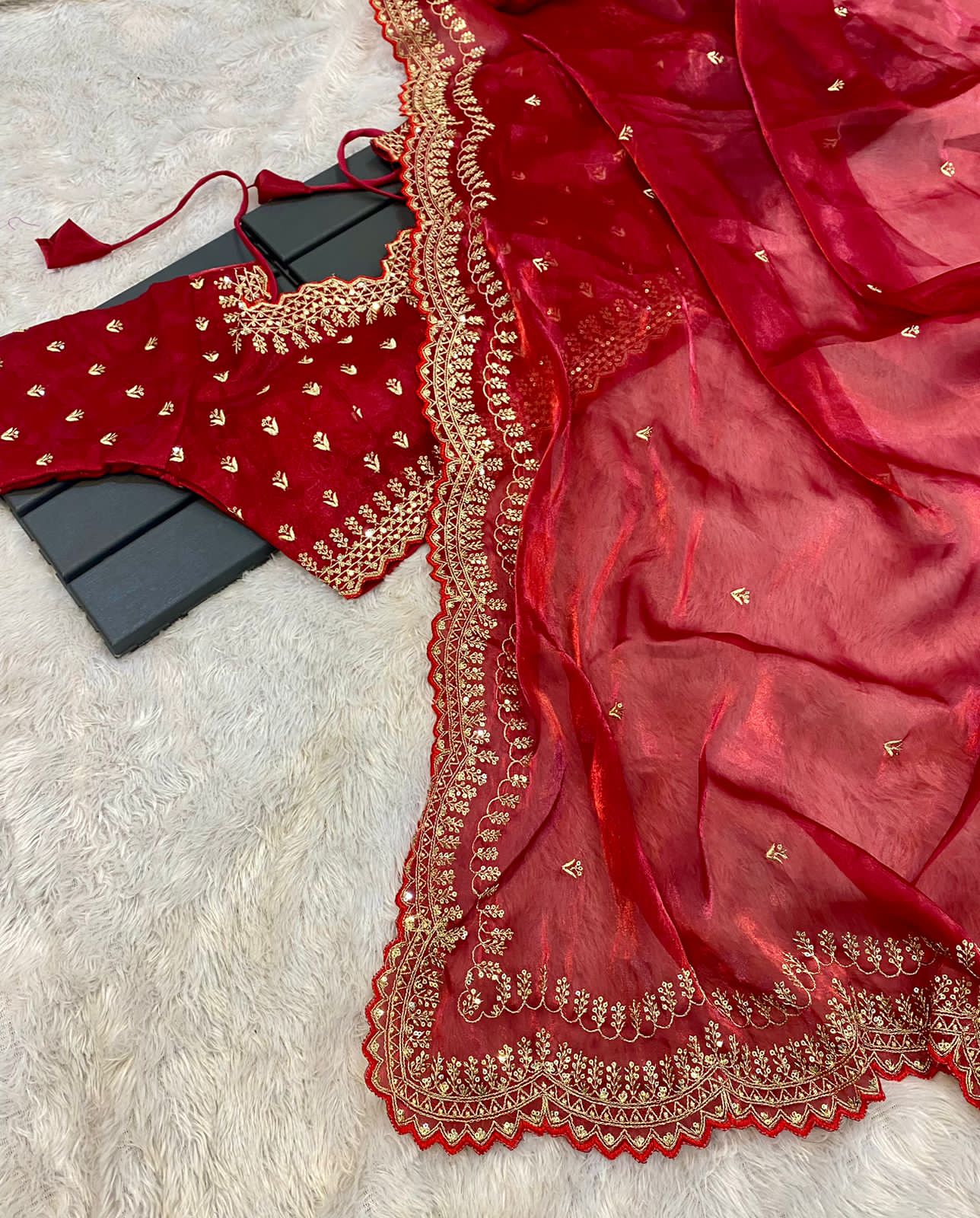 hinning pure crystal silk Jimmy choo sarees with seqnce & golden zari embroidered