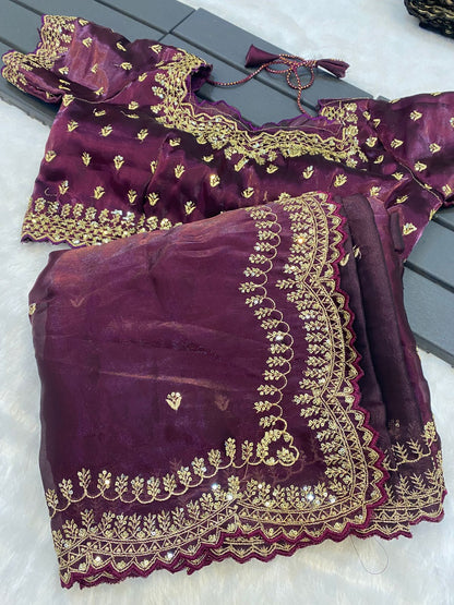hinning pure crystal silk Jimmy choo sarees with seqnce & golden zari embroidered