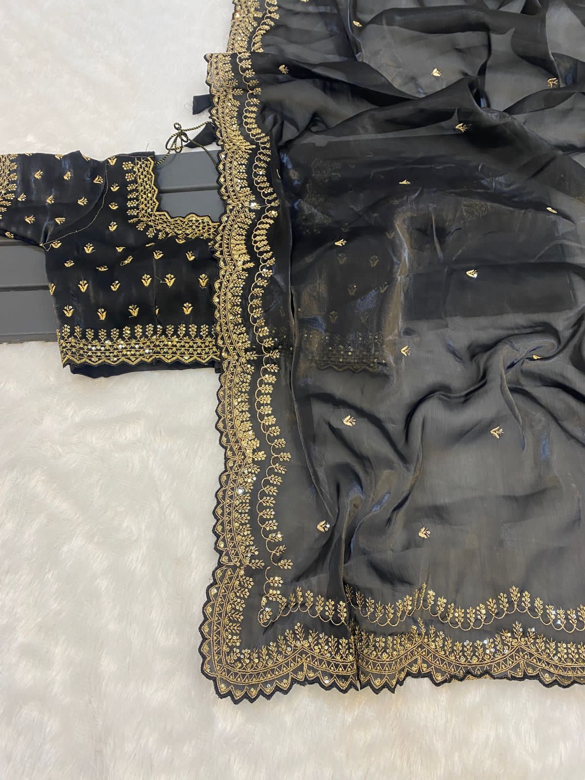 hinning pure crystal silk Jimmy choo sarees with seqnce & golden zari embroidered