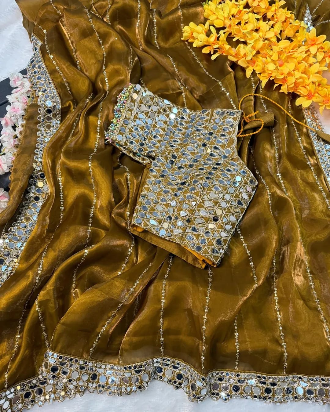 Soft satin Organza saree which is embedded with real mirror work Embroidery