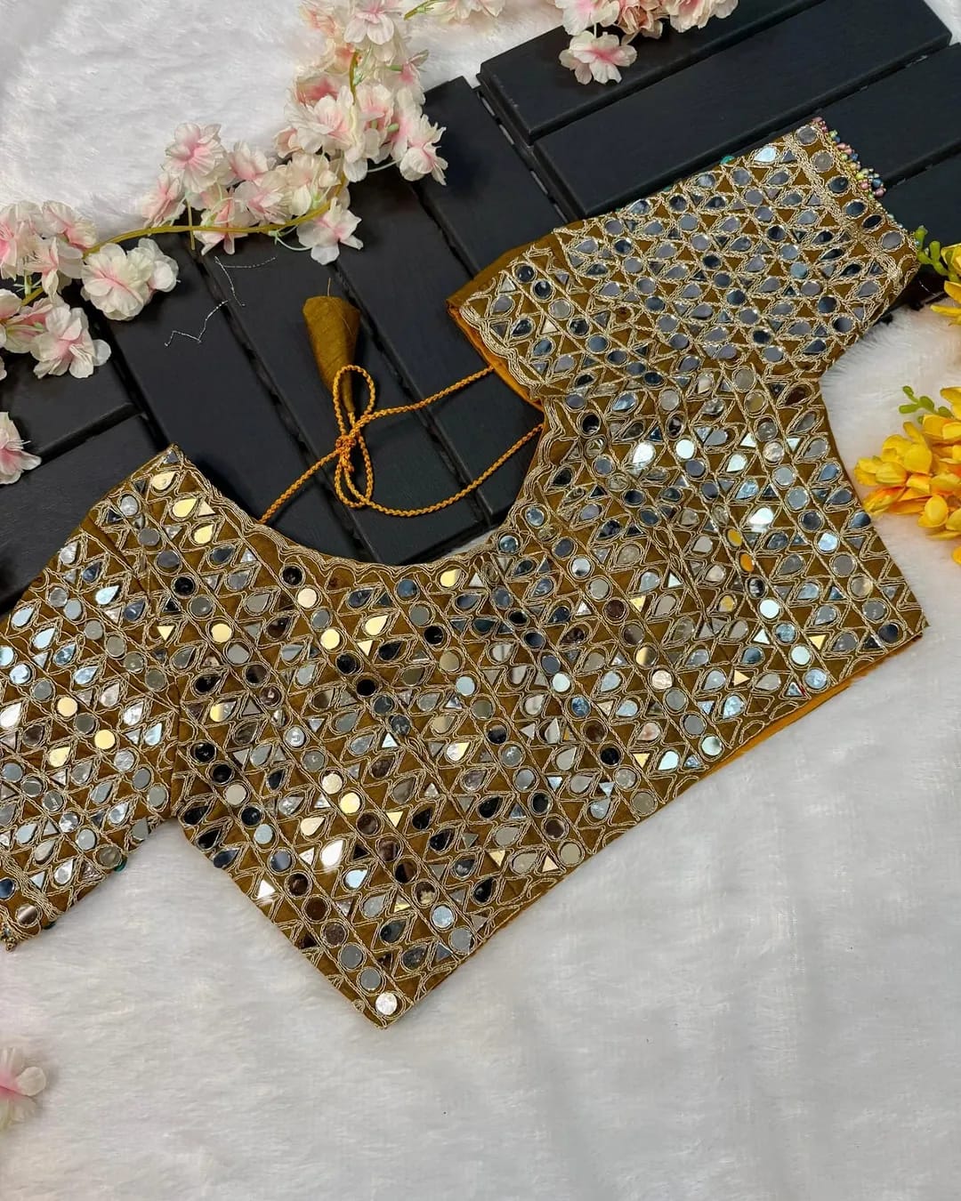 Soft satin Organza saree which is embedded with real mirror work Embroidery