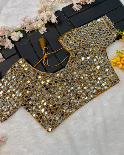 Soft satin Organza saree which is embedded with real mirror work Embroidery