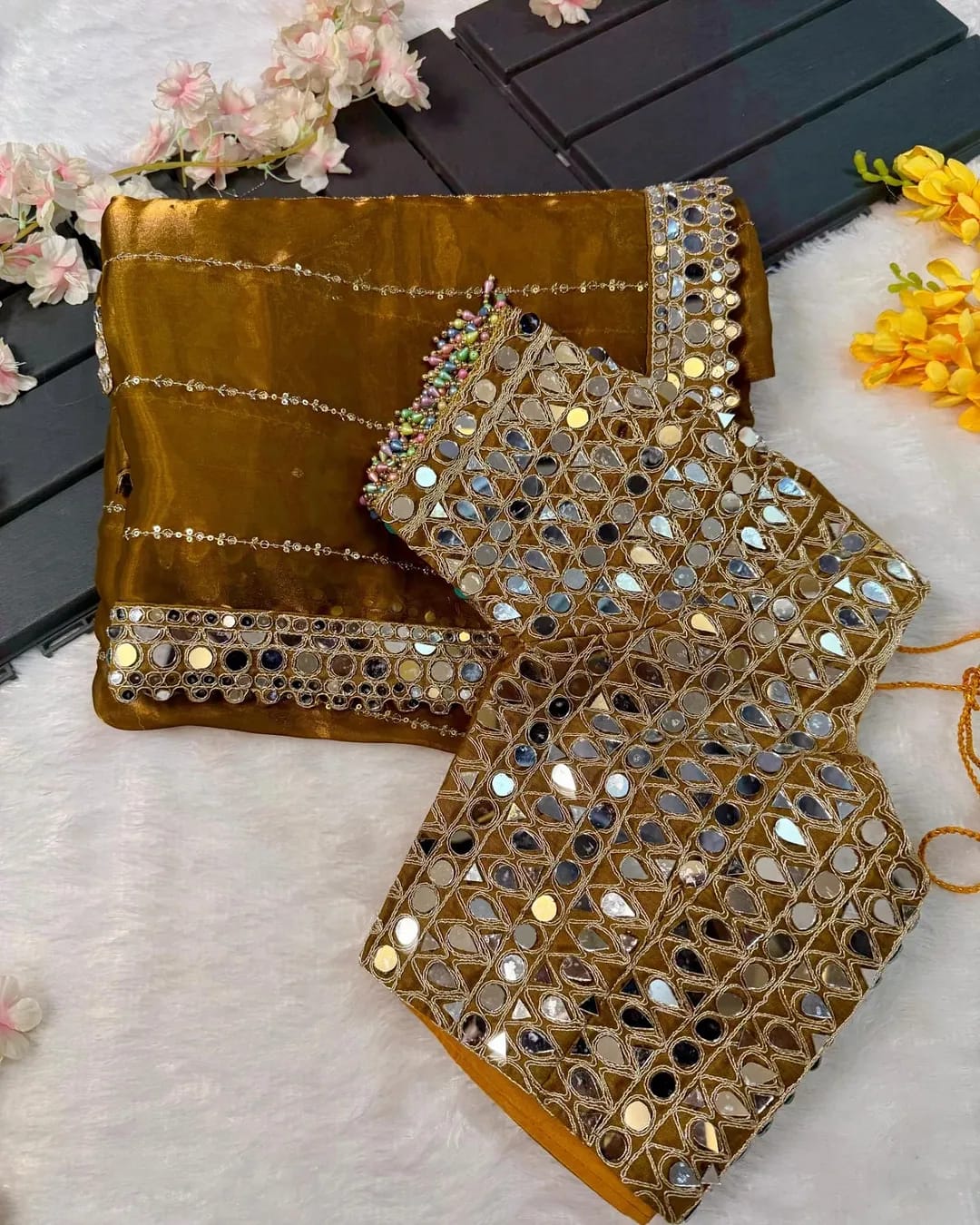 Soft satin Organza saree which is embedded with real mirror work Embroidery