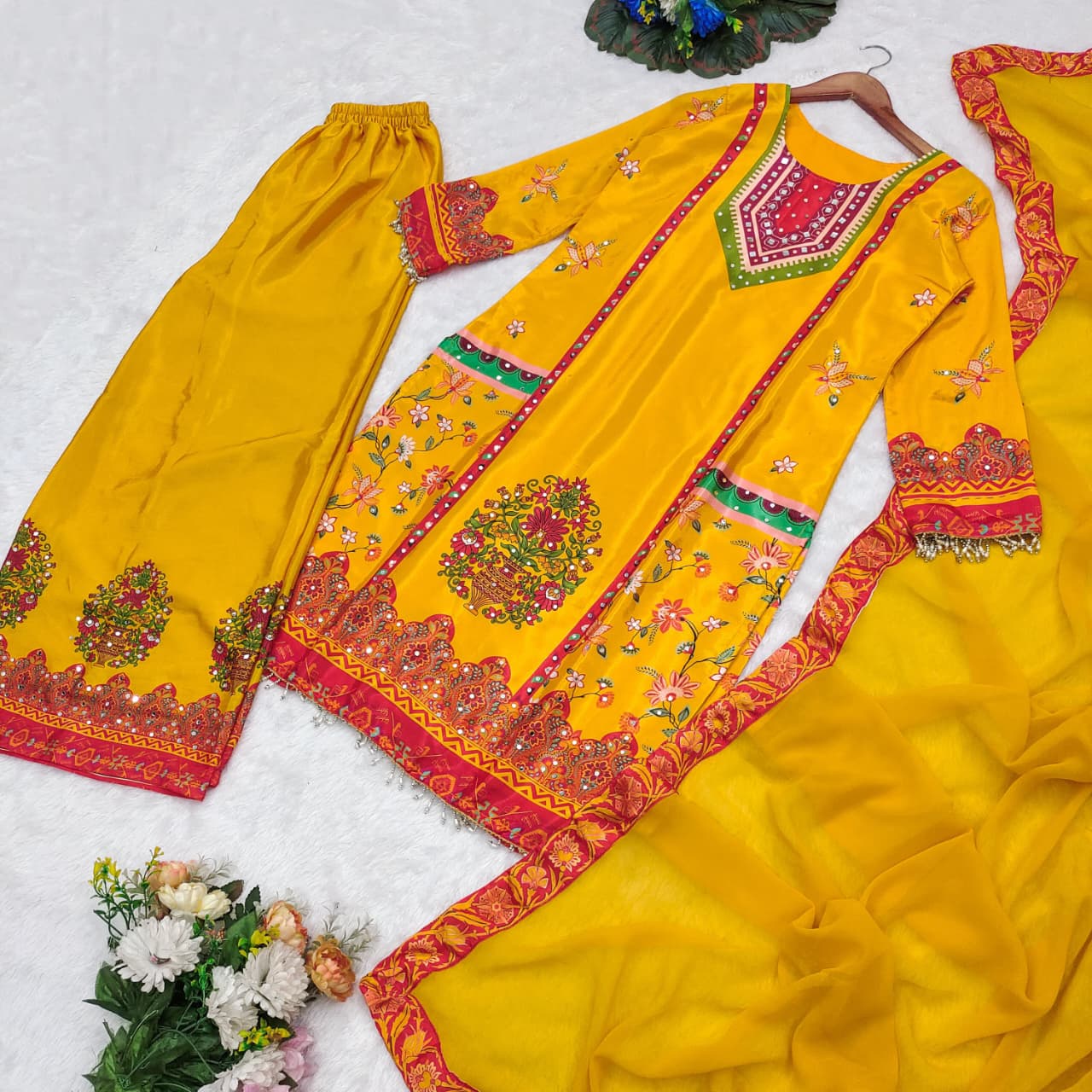 Bring elegance to your wardrobe with this beautifully designed *Digital Print Set with Real Mirror Work* – perfect for every occasion where you want to shine effortlessly! 💃💫