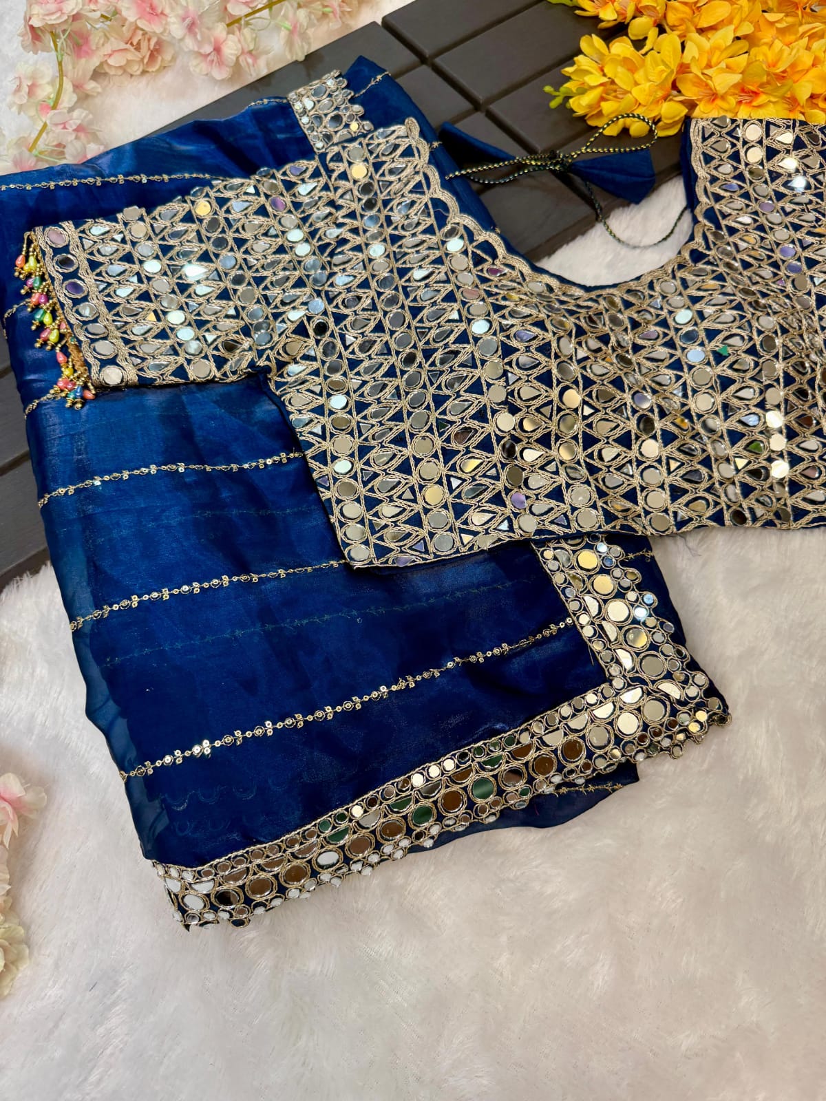 Soft satin Organza saree which is embedded with real mirror work Embroidery