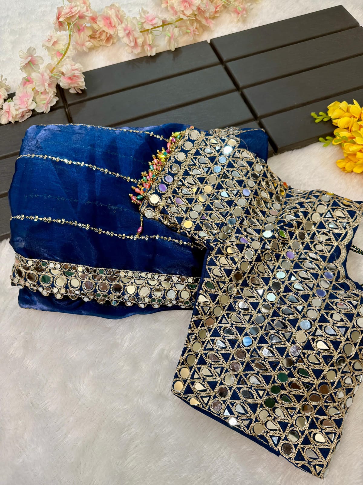 Soft satin Organza saree which is embedded with real mirror work Embroidery