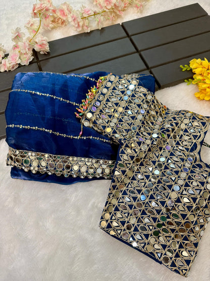 Soft satin Organza saree which is embedded with real mirror work Embroidery