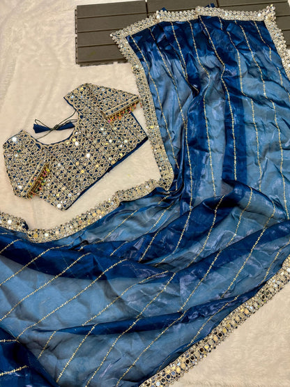 Soft satin Organza saree which is embedded with real mirror work Embroidery