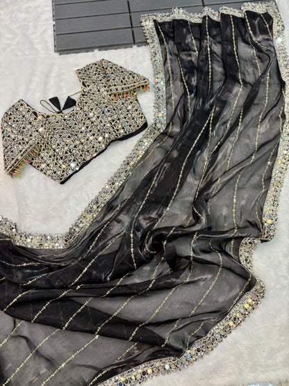 Soft satin Organza saree which is embedded with real mirror work Embroidery