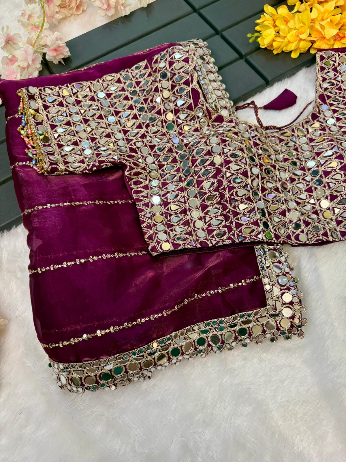 Soft satin Organza saree which is embedded with real mirror work Embroidery