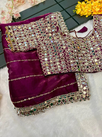 Soft satin Organza saree which is embedded with real mirror work Embroidery