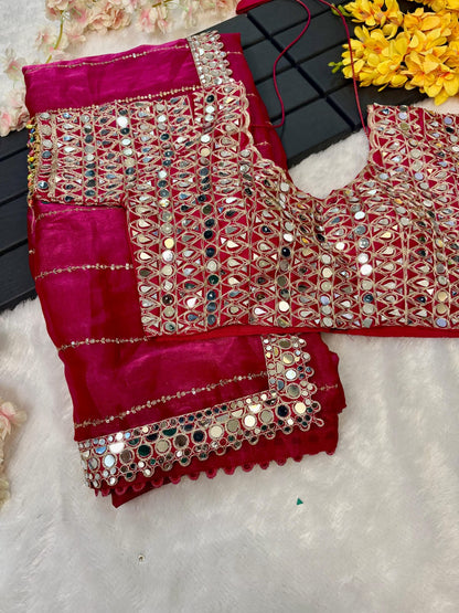 Soft satin Organza saree which is embedded with real mirror work Embroidery
