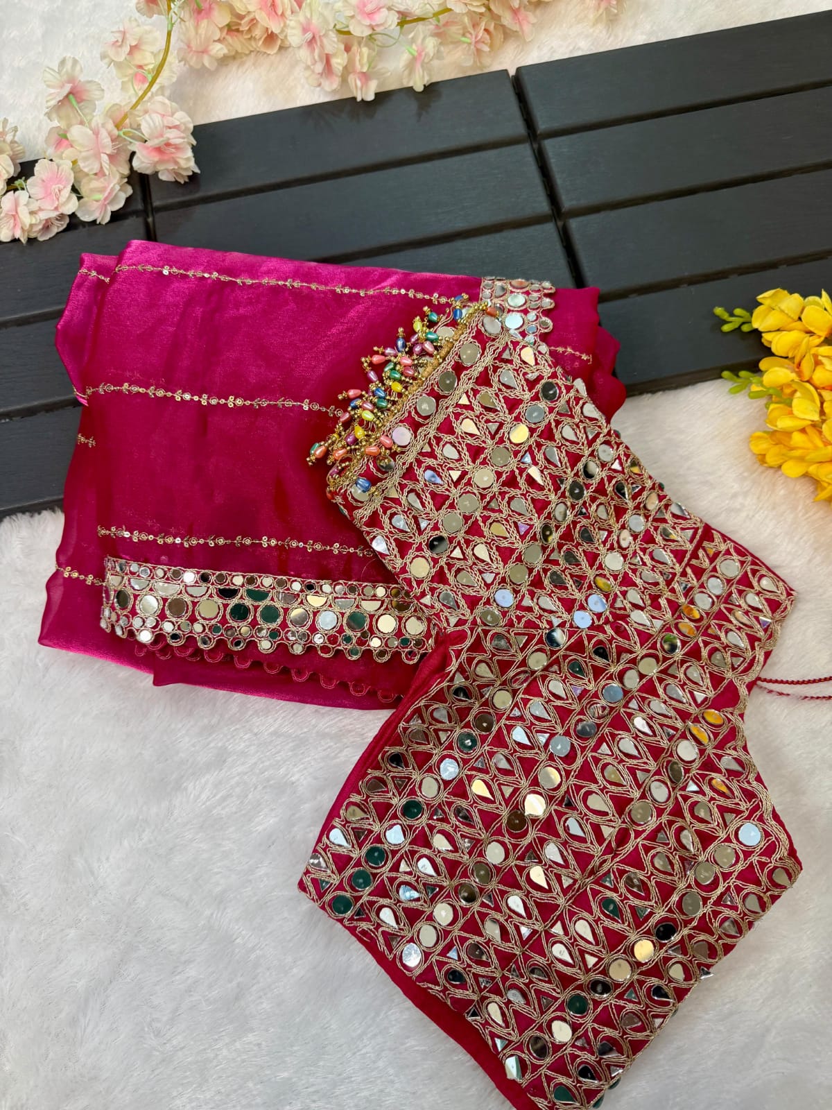 Soft satin Organza saree which is embedded with real mirror work Embroidery